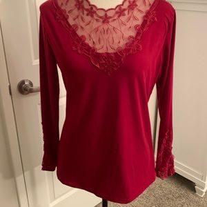 Red long sleeve blouse with lace detailing